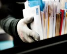 Man sorting mail