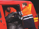 Postal workers loading van