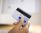 Hand holding credit card