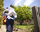 Mailman delivering mail