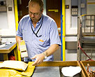 Man sorting mail