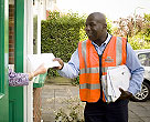 Postman delivering mail