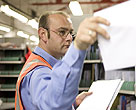 Man sorting post