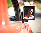 Postman driving post van