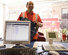 Postman picking up mail from office