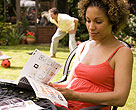 Lady reading in garden