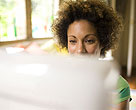 Woman looking at computer