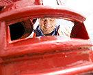 Mailman emptying mail box
