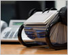 Address book and telephone on desk