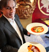 Peter Ilic holding a plate of food