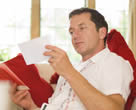 Man reading statement