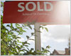 A sold sign outside a house