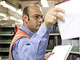 Man sorting post