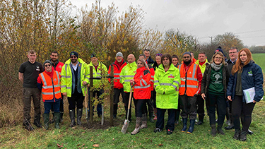 Royal Mail staff at the Queen Elizabeth II Commemorative Royal Mail Woodland