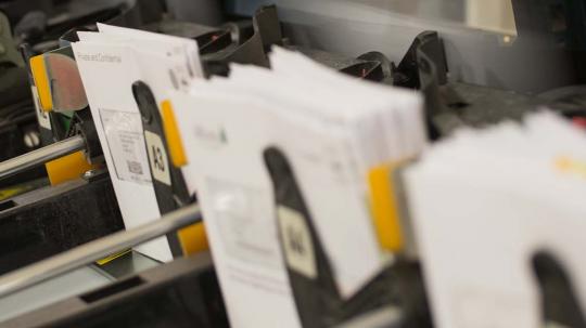 Mail being sorted at a mail centre 