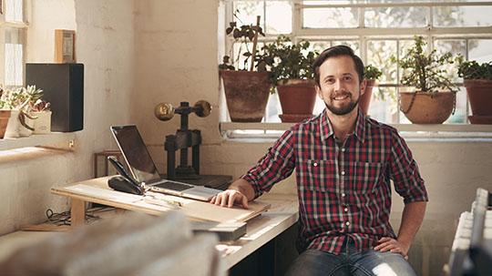 A small business owner in his office